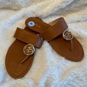 Brown bebe sandals.